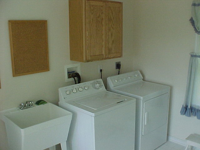 First floor laundry room off the garage.